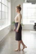 Model wearing Nuggles® 27" Classic Skirt  in Steel Gray