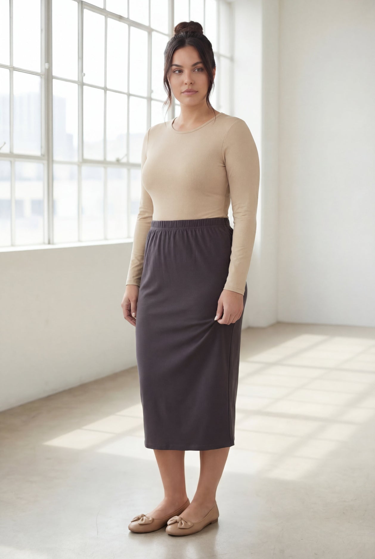 Model wearing Nuggles® 31" Classic Skirt  in Steel Gray