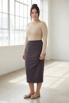 Model wearing Nuggles® 31" Classic Skirt  in Steel Gray