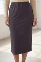 Model wearing Nuggles® 31" Classic Skirt  in Steel Gray