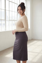 Model wearing Nuggles® 31" Classic Skirt  in Steel Gray
