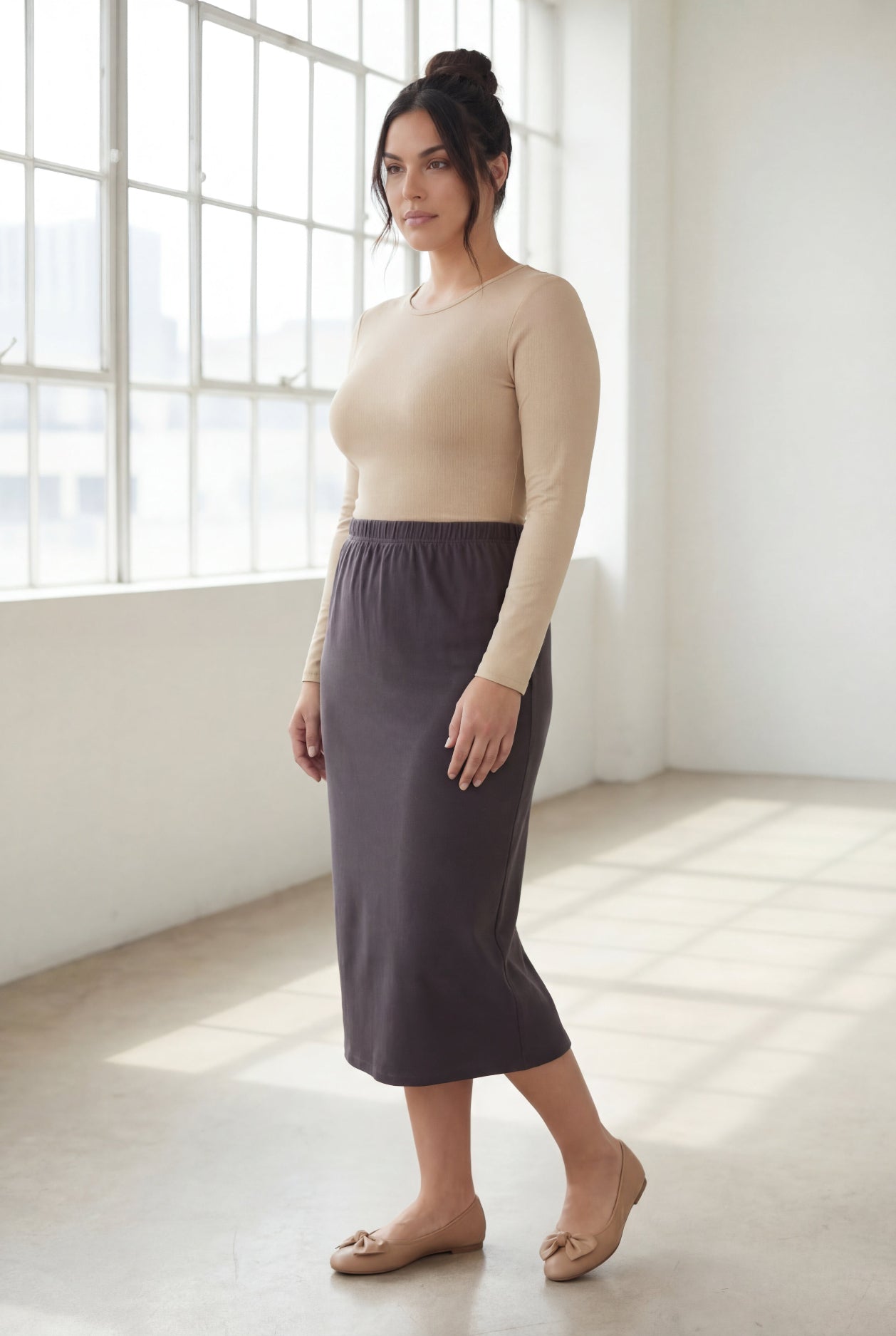 Model wearing Nuggles® 31" Classic Skirt  in Steel Gray