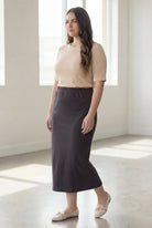 Model wearing Nuggles® 34" Classic Skirt  in Steel Gray