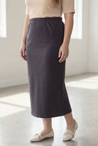 Model wearing Nuggles® 34" Classic Skirt  in Steel Gray