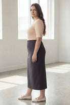 Model wearing Nuggles® 34" Classic Skirt  in Steel Gray