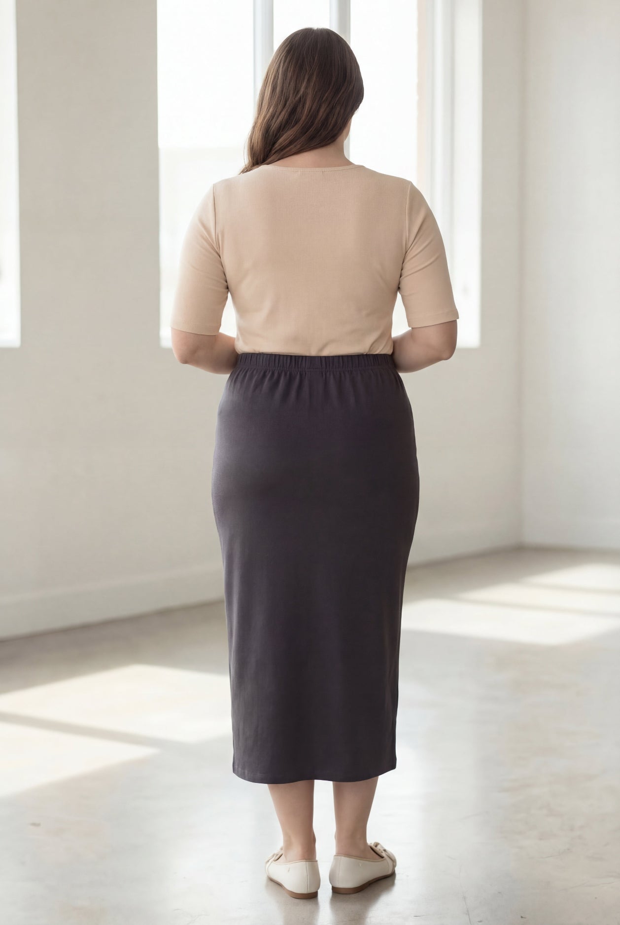 Model wearing Nuggles® 34" Classic Skirt  in Steel Gray