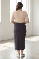 Model wearing Nuggles® 34" Classic Skirt  in Steel Gray