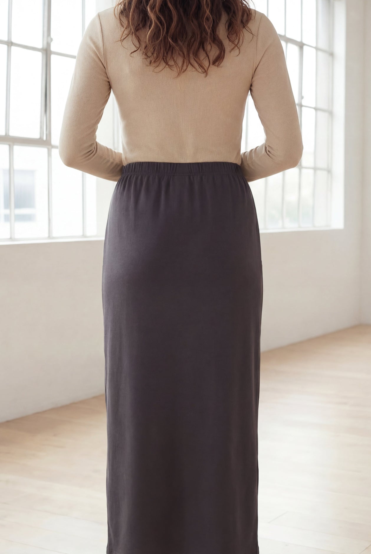 Model wearing Nuggles® 36" Classic Skirt  in Steel Gray