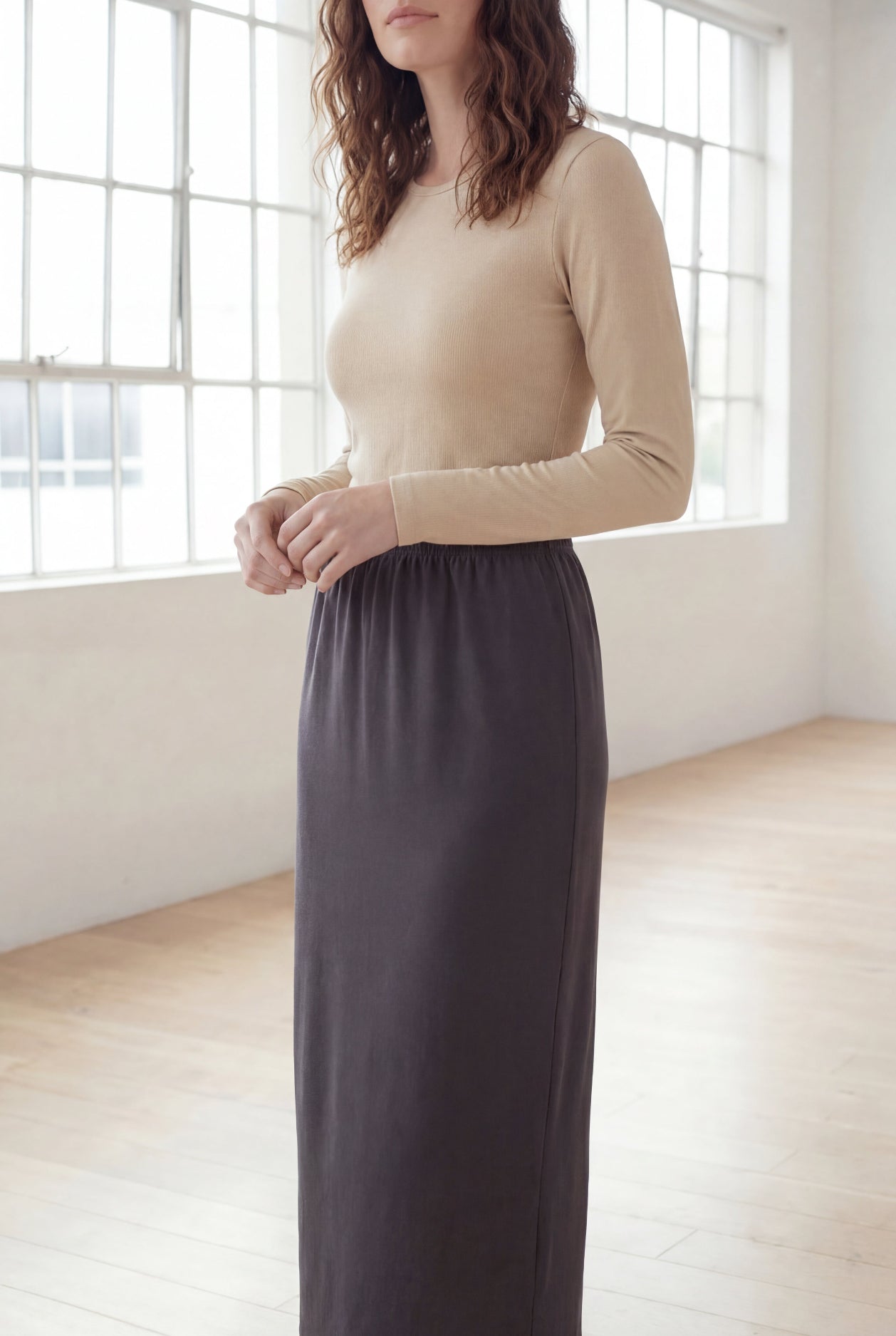 Model wearing Nuggles® 36" Classic Skirt  in Steel Gray