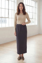 Model wearing Nuggles® 36" Classic Skirt  in Steel Gray