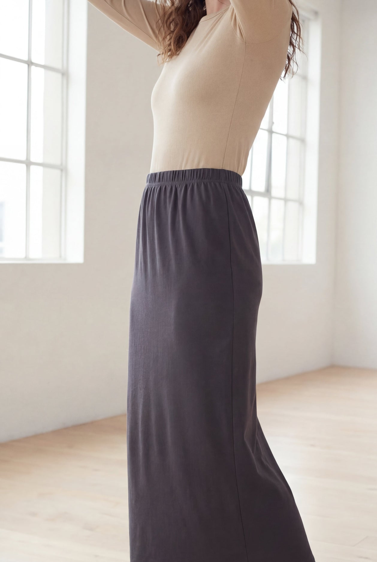 Model wearing Nuggles® 36" Classic Skirt  in Steel Gray