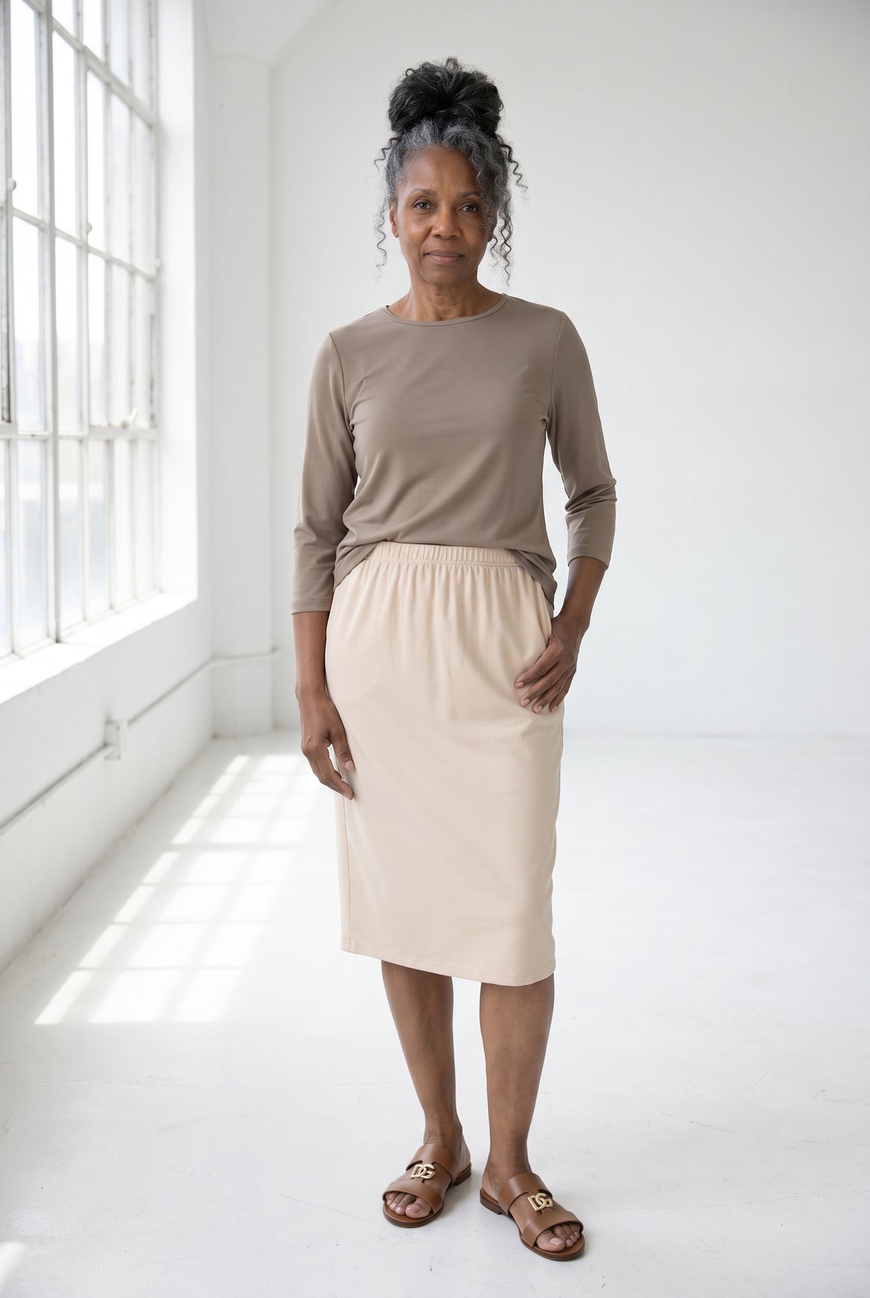 Model wearing Nuggles®  Half Sleeve Essential Tee in Taupe