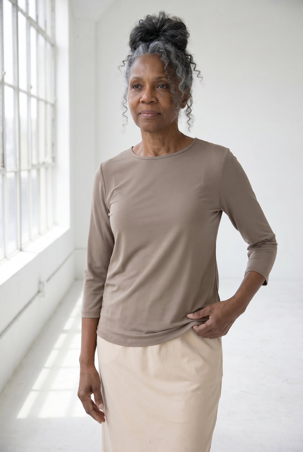 Model wearing Nuggles®  Half Sleeve Essential Tee in Taupe