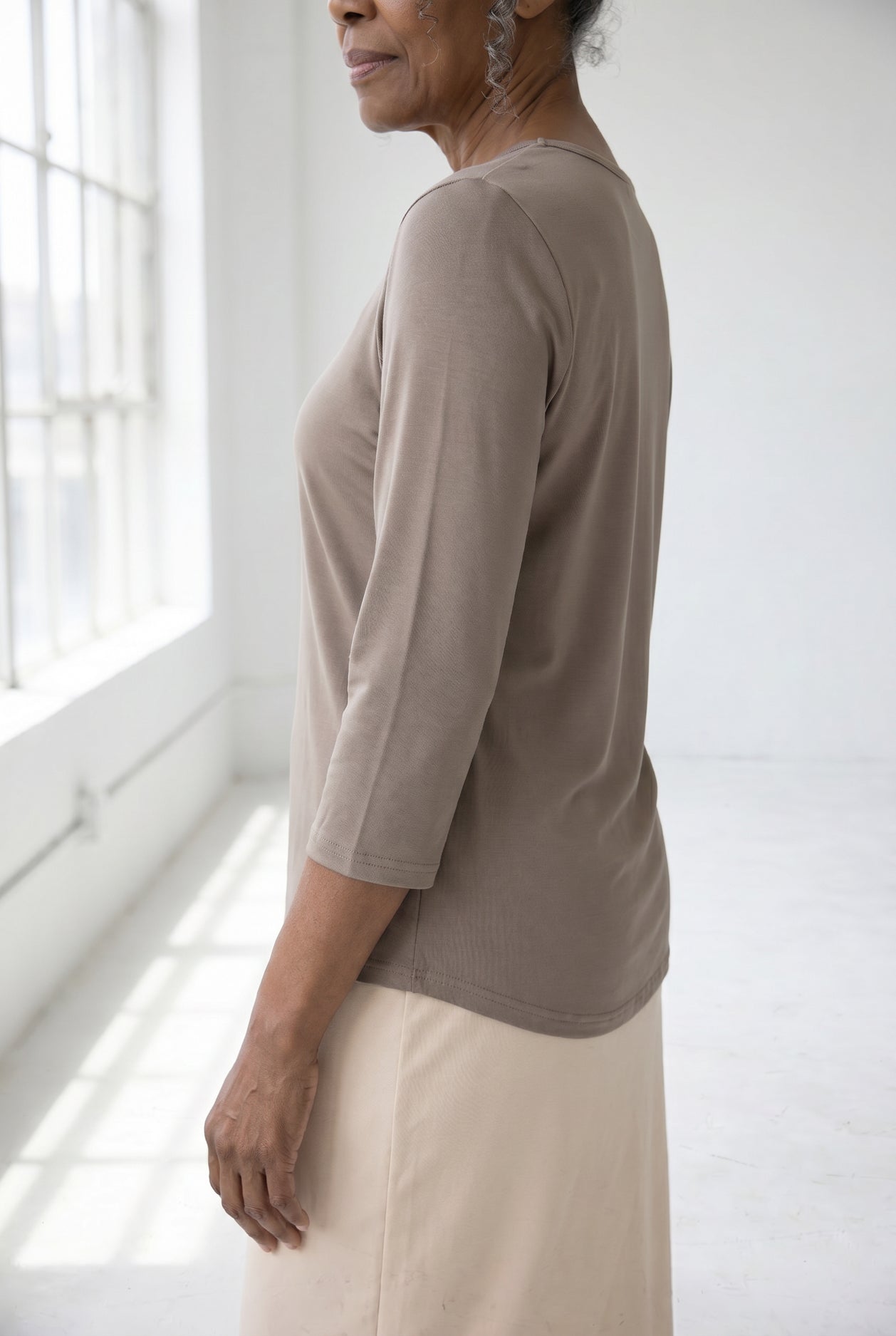 Model wearing Nuggles®  Half Sleeve Essential Tee in Taupe