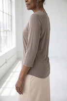 Model wearing Nuggles®  Half Sleeve Essential Tee in Taupe