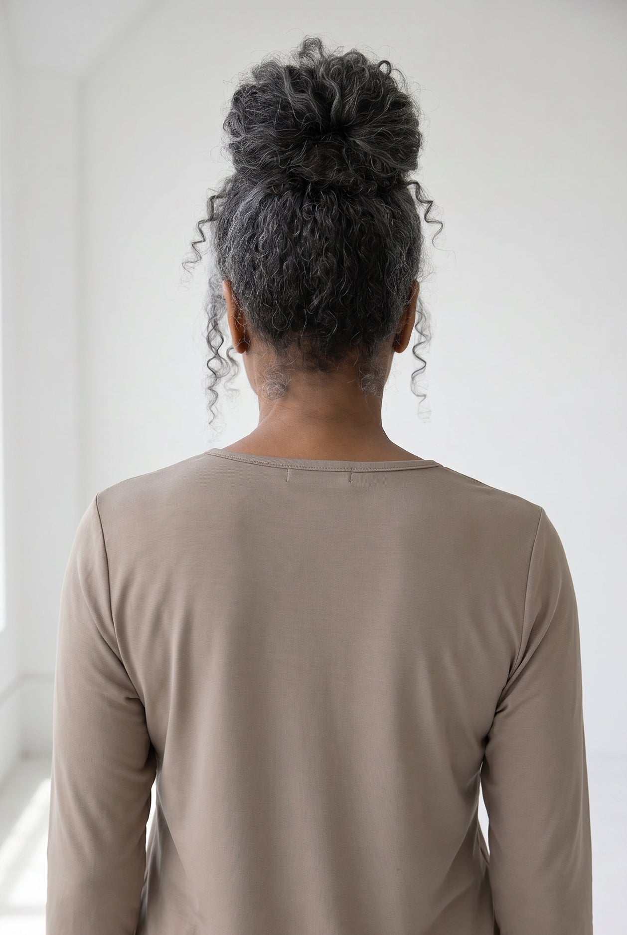 Model wearing Nuggles®  Half Sleeve Essential Tee in Taupe