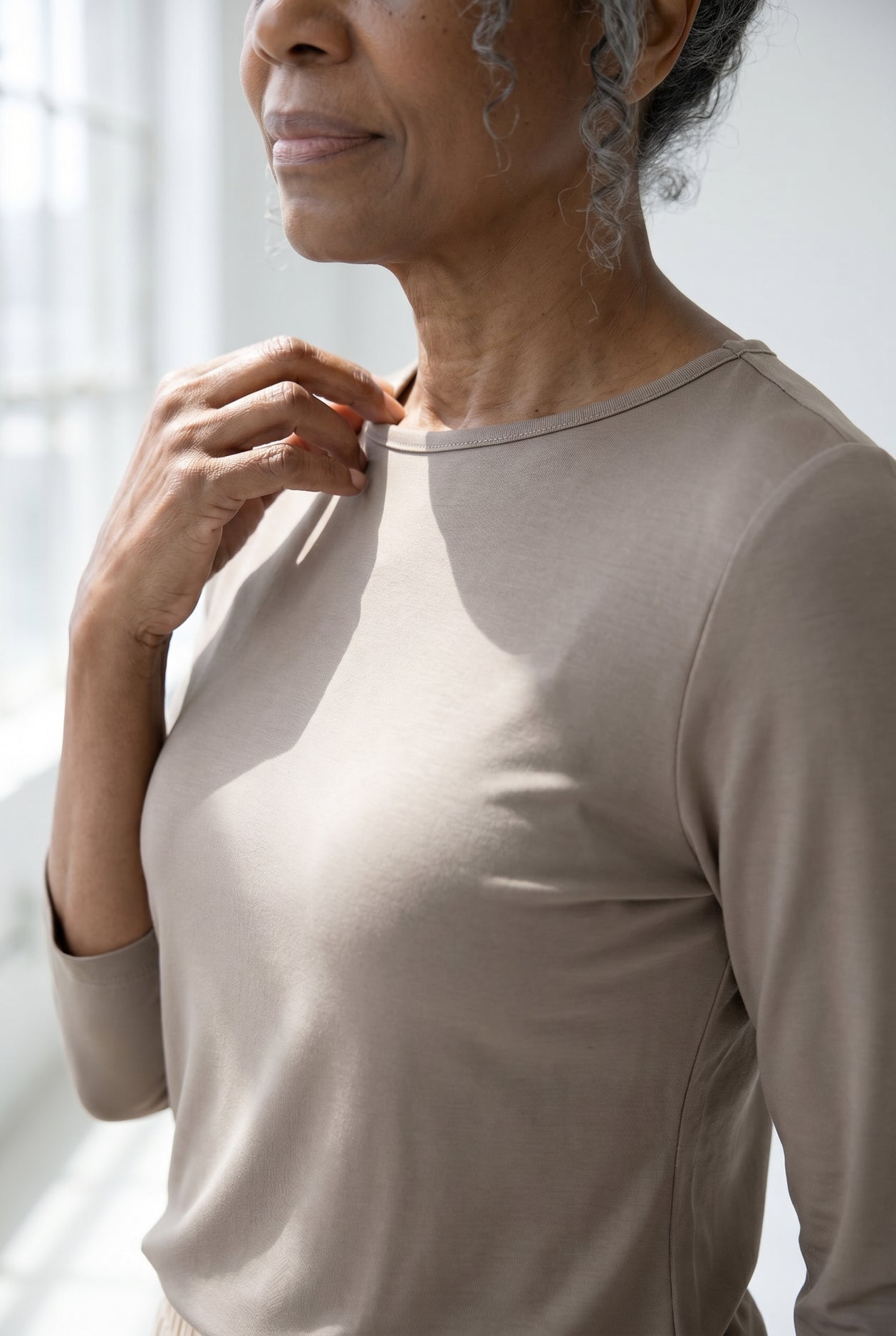 Model wearing Nuggles®  Half Sleeve Essential Tee in Taupe