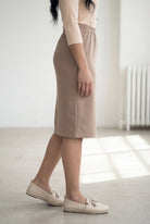 Model wearing Nuggles® 25" Classic Skirt in Taupe