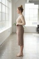 Model wearing Nuggles® 27" Classic Skirt  in Taupe