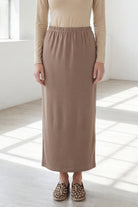 Model wearing Nuggles® 36" Classic Skirt  in Taupe