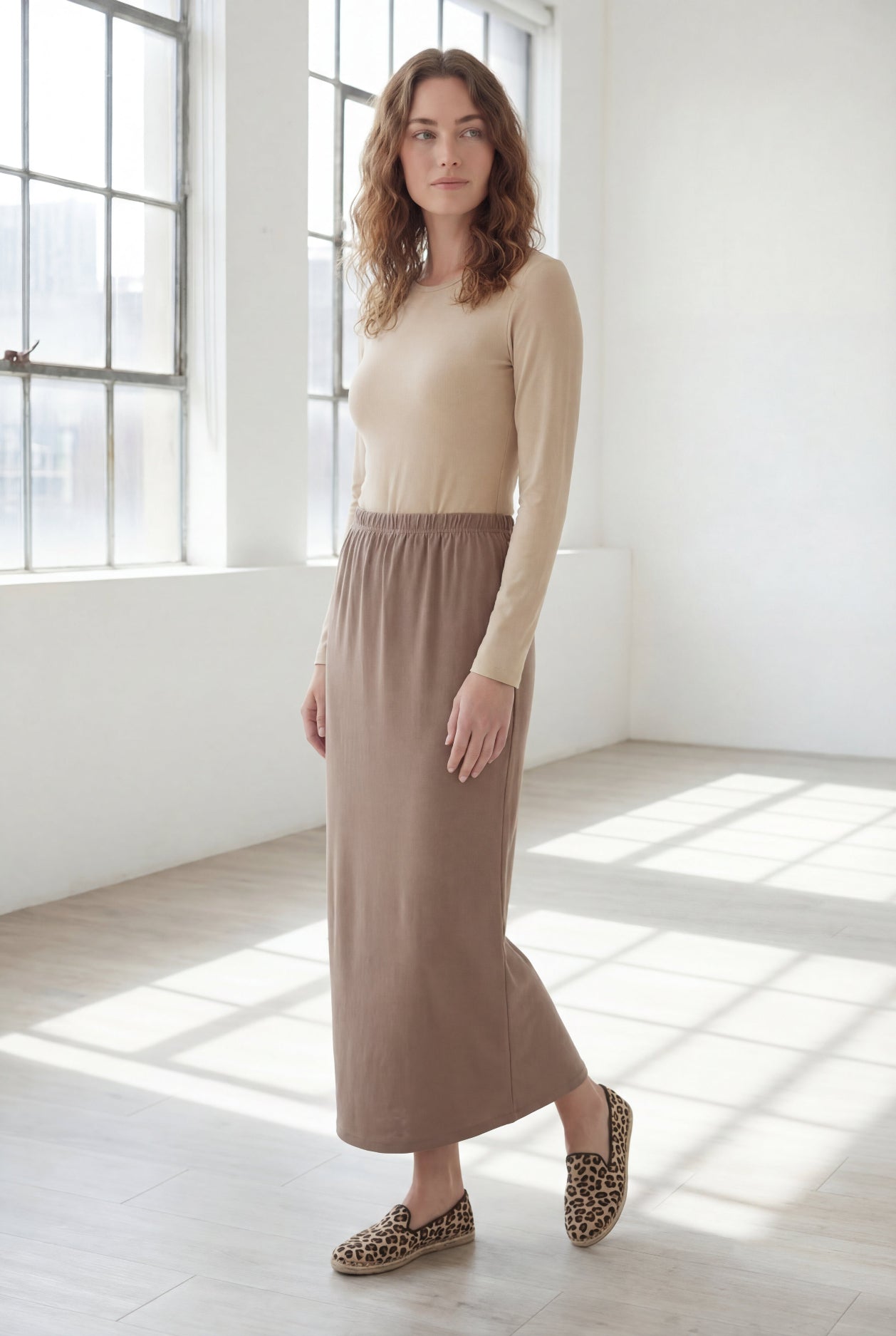 Model wearing Nuggles® 36" Classic Skirt  in Taupe