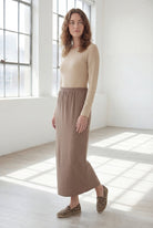 Model wearing Nuggles® 36" Classic Skirt  in Taupe