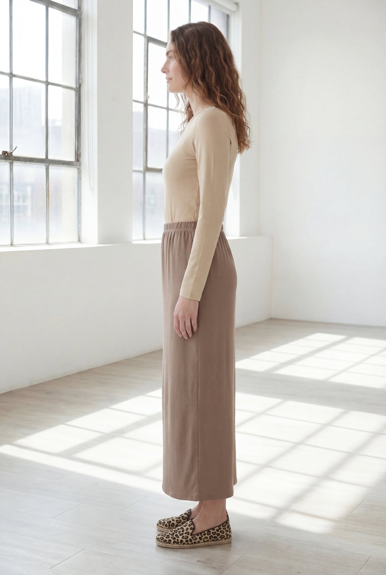 Model wearing Nuggles® 36" Classic Skirt  in Taupe