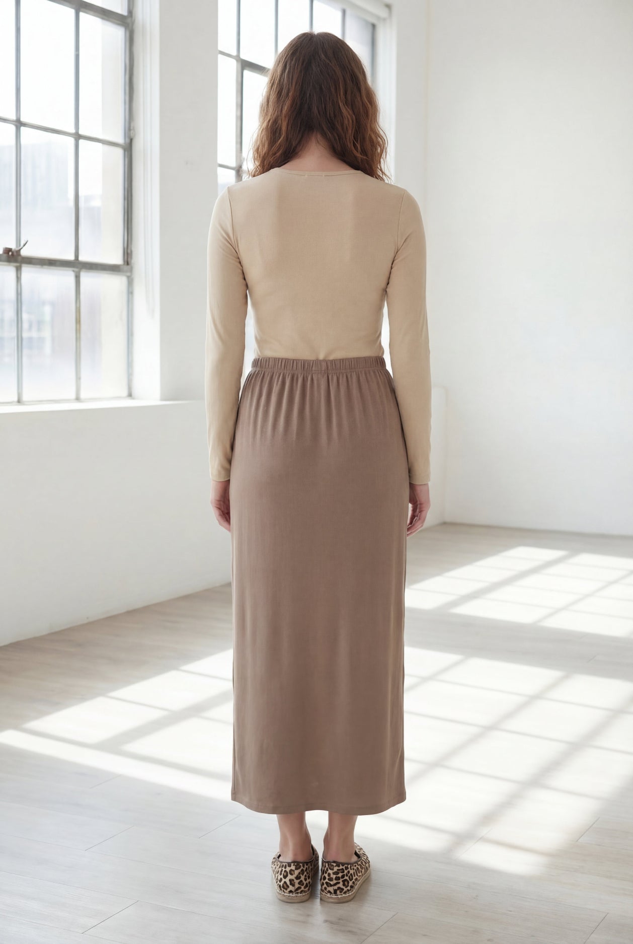 Model wearing Nuggles® 36" Classic Skirt  in Taupe