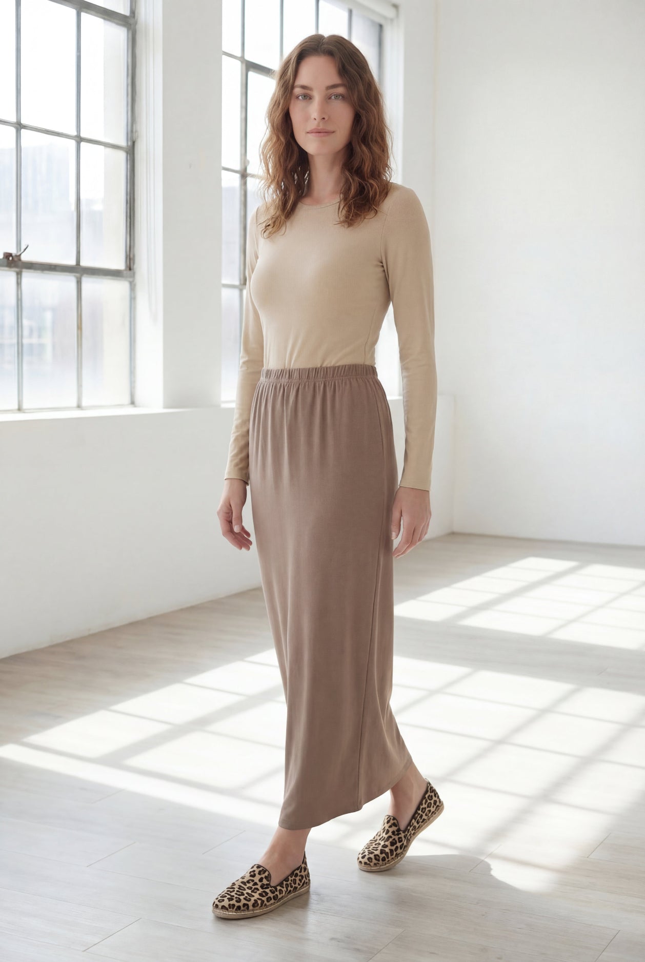 Model wearing Nuggles® 36" Classic Skirt  in Taupe