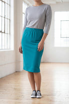 Model wearing Nuggles® 25" Classic Skirt in Tealng