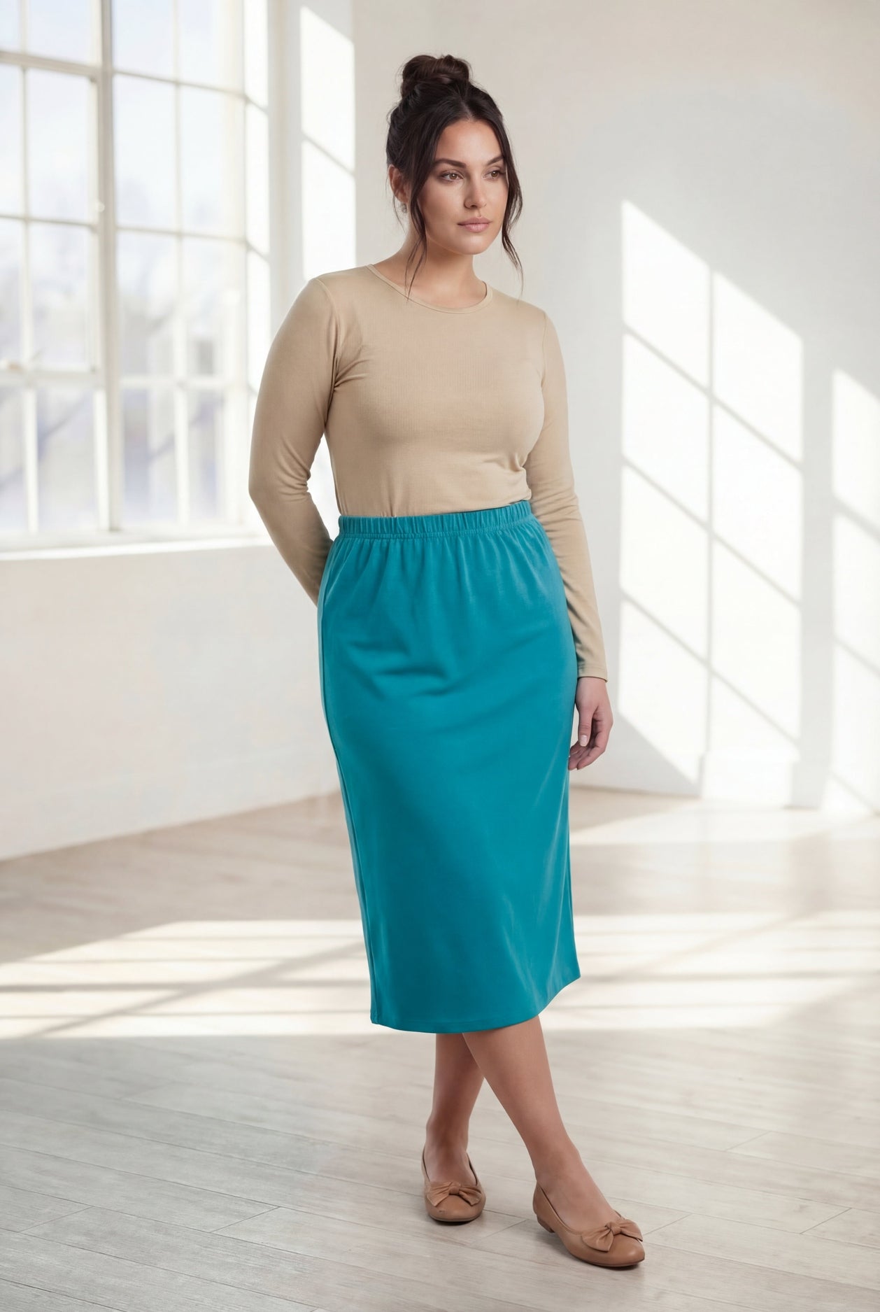 Model wearing Nuggles® 31" Classic Skirt in Teal