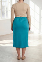 Model wearing Nuggles® 31" Classic Skirt in Teal