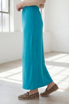 Model wearing Nuggles® 36" Classic Skirt in Teal