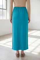 Model wearing Nuggles® 36" Classic Skirt in Teal
