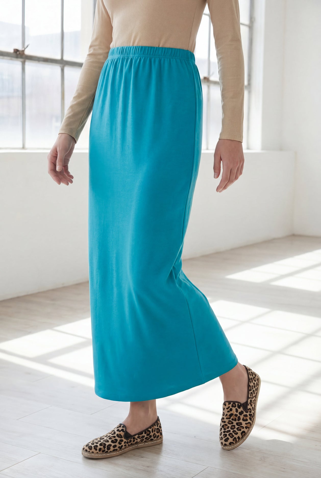 Model wearing Nuggles® 36" Classic Skirt in Teal