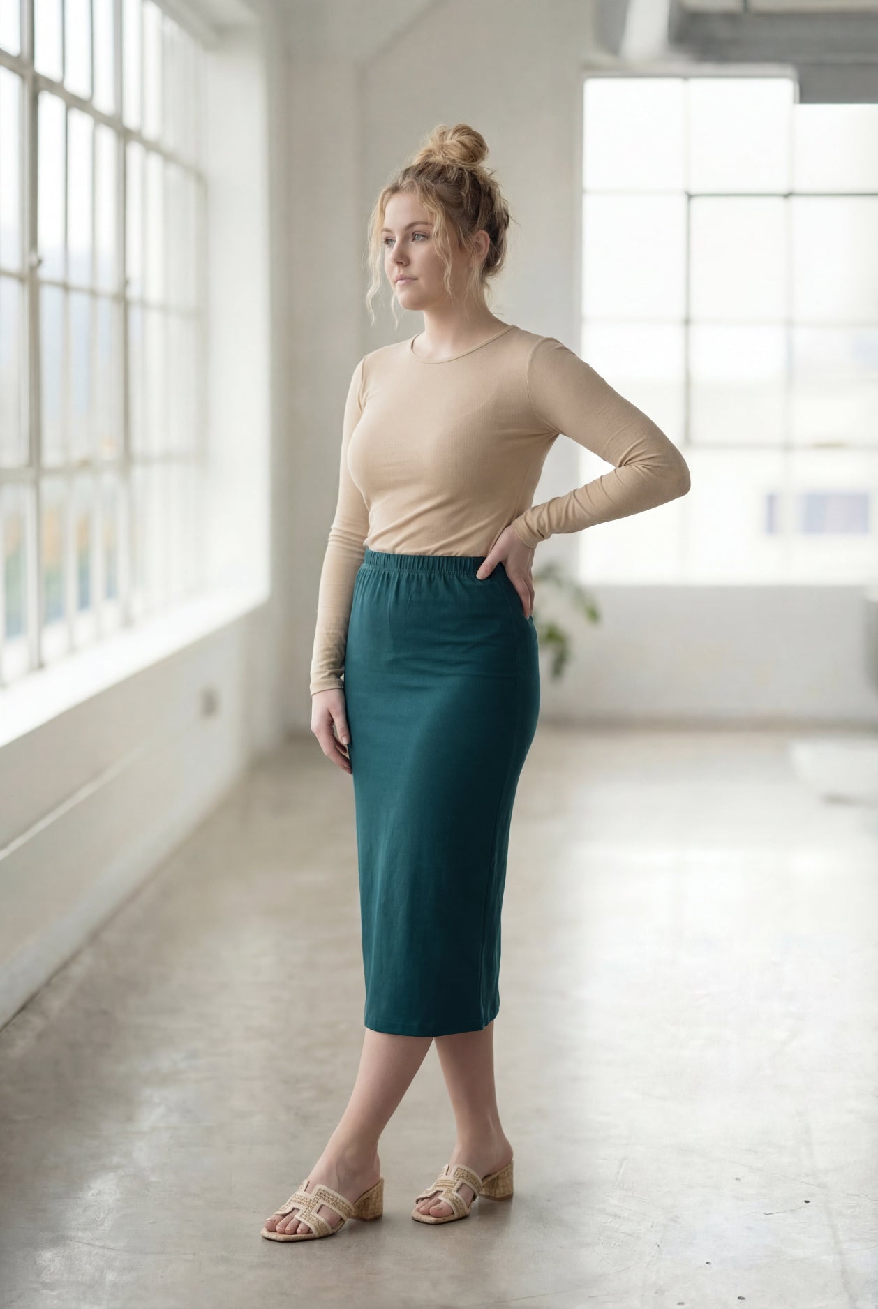 Model wearing Nuggles® 27" Classic Skirt  in Teal Green 