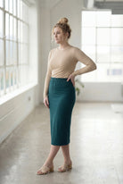 Model wearing Nuggles® 27" Classic Skirt  in Teal Green 