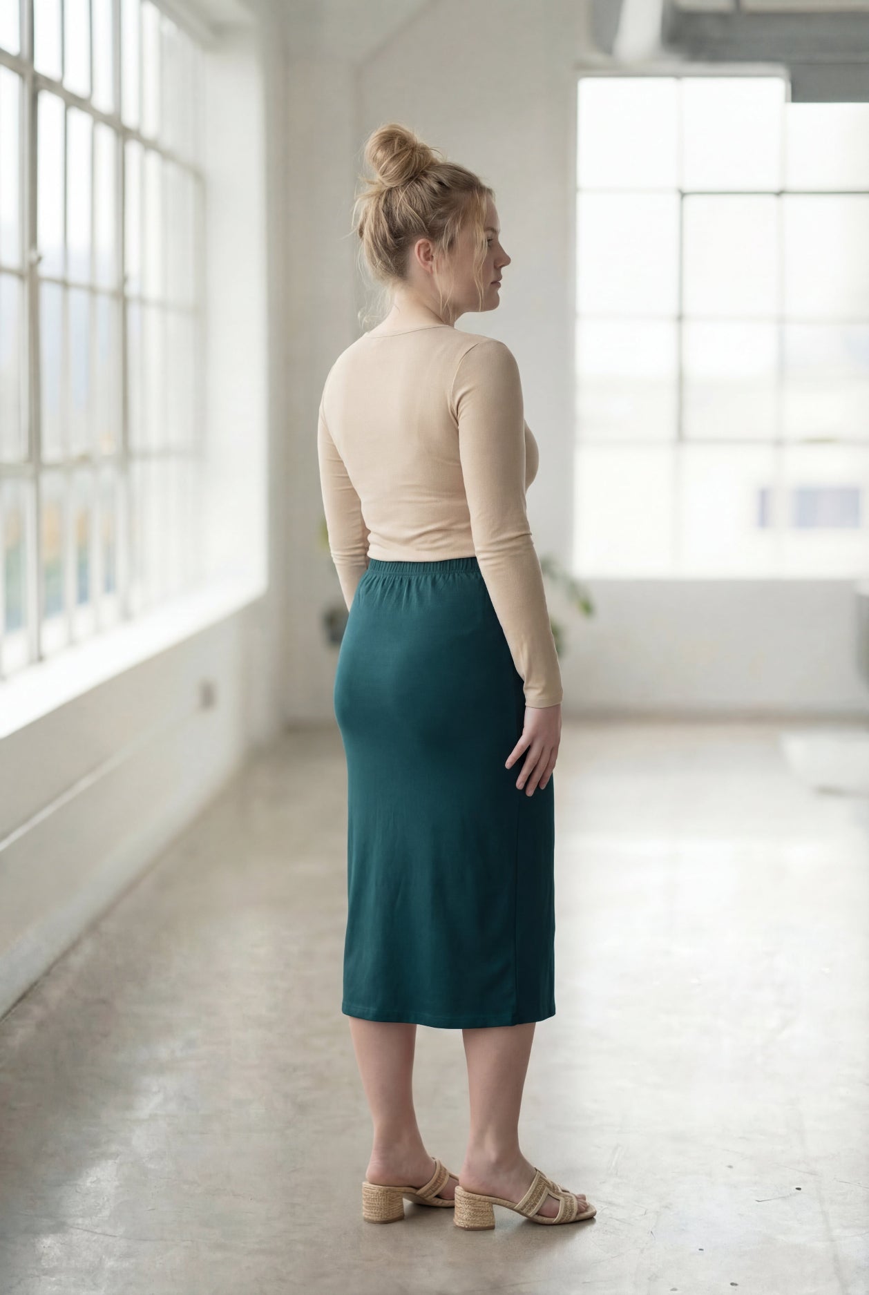 Model wearing Nuggles® 27" Classic Skirt  in Teal Green