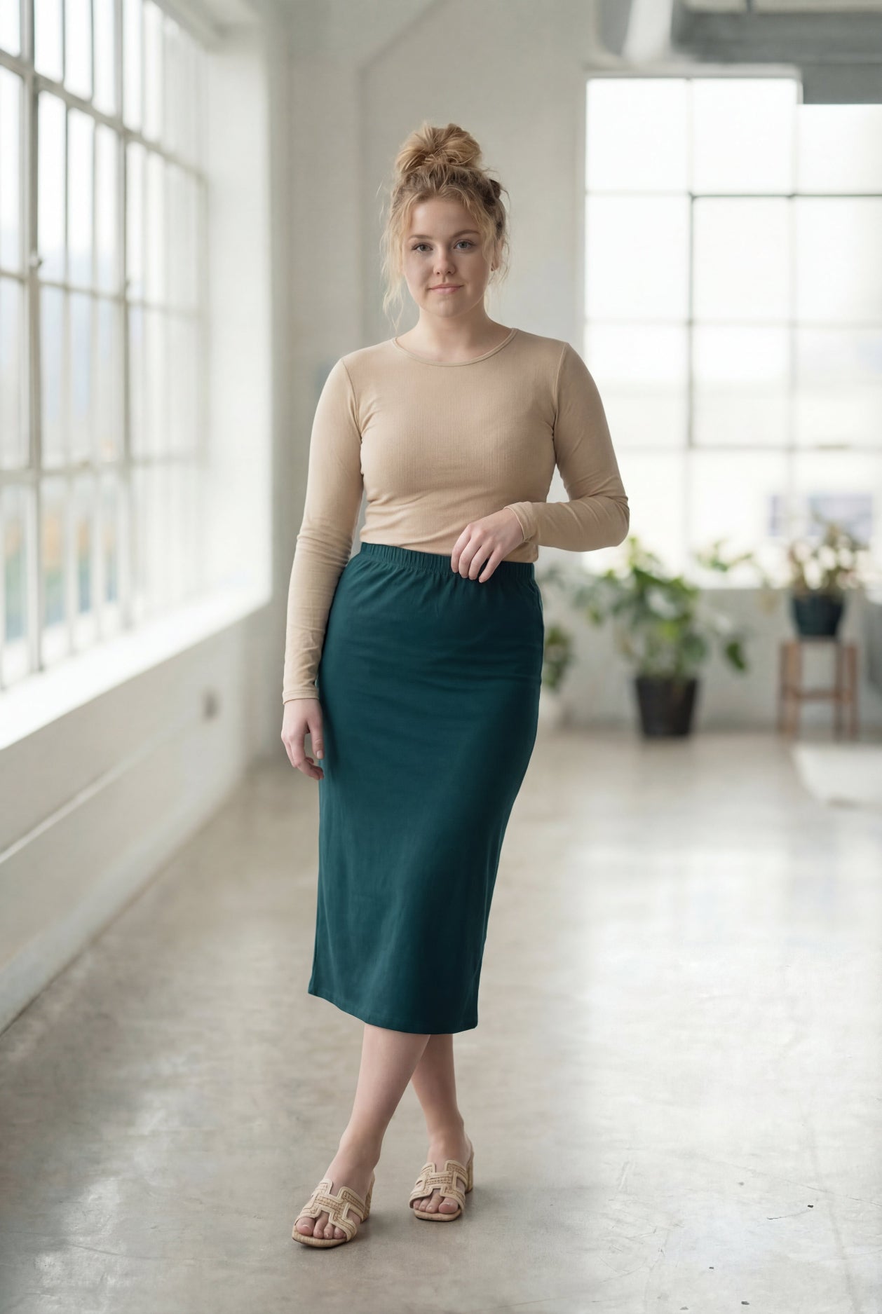 Model wearing Nuggles® 27" Classic Skirt  in Teal Green