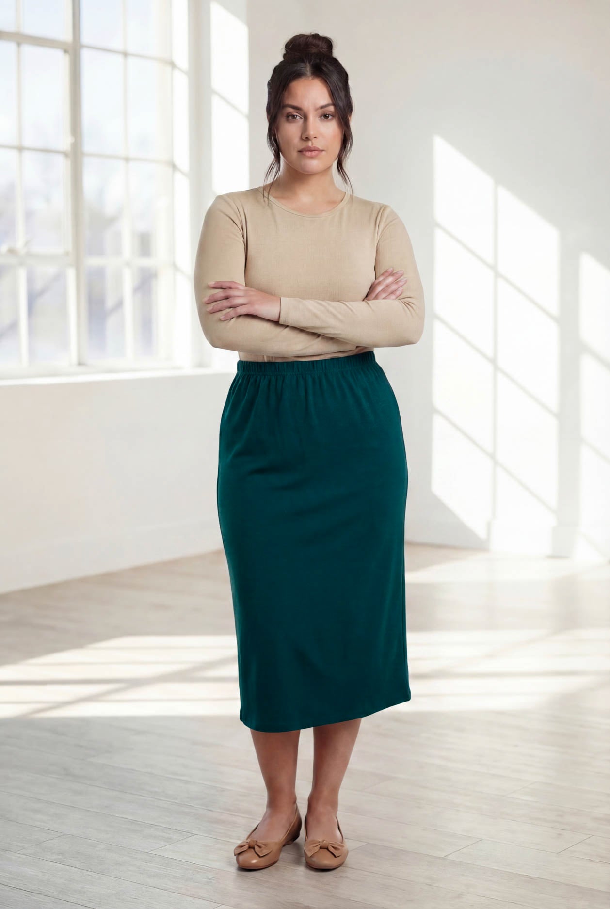 Model wearing Nuggles® 31" Classic Skirt  in Teal Green