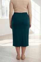 Model wearing Nuggles® 31" Classic Skirt  in Teal Green