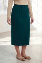 Model wearing Nuggles® 31" Classic Skirt  in Teal Green