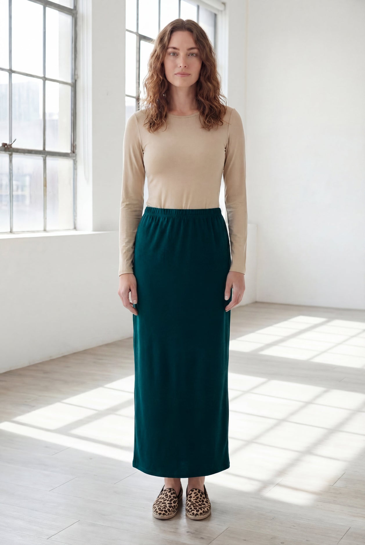Model wearing Nuggles® 36" Classic Skirt  in Teal Green