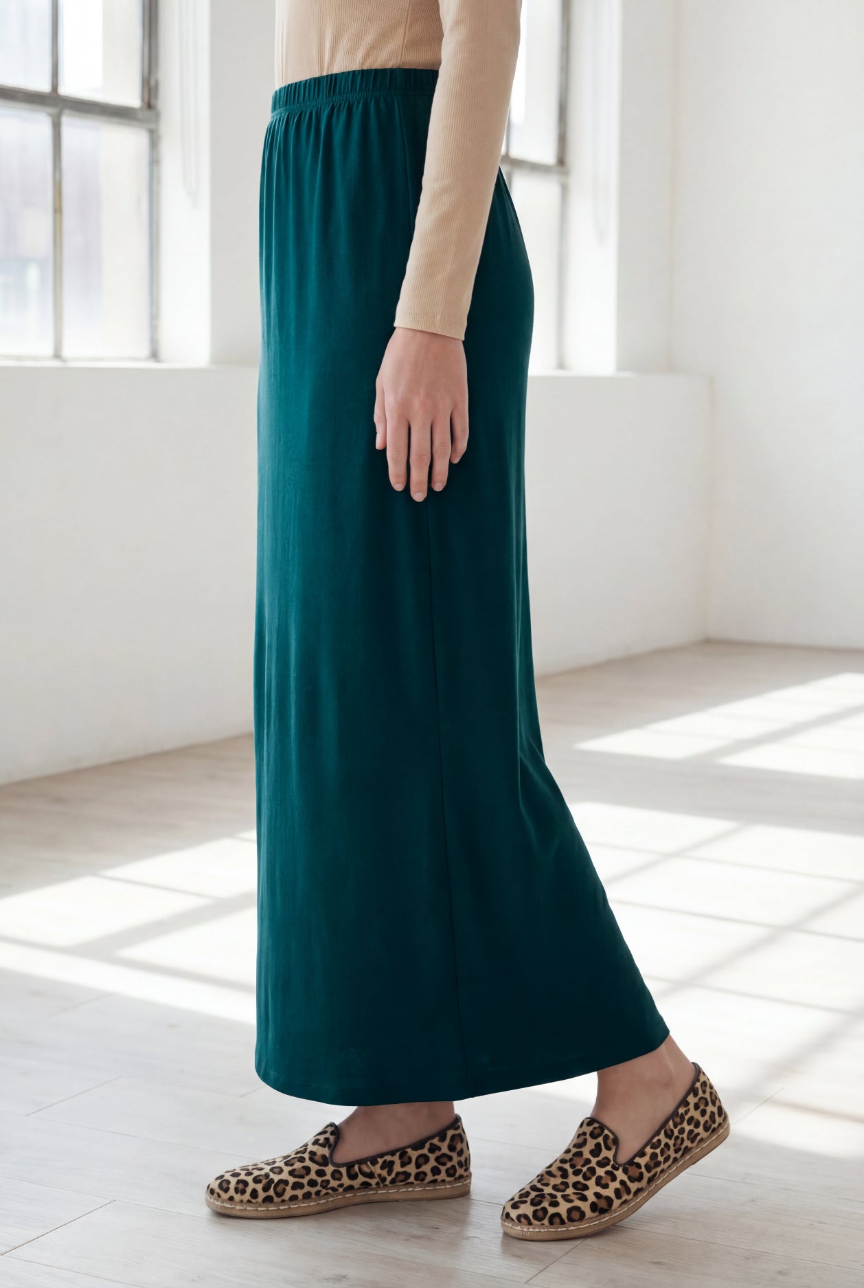 Model wearing Nuggles® 36" Classic Skirt  in Teal Green