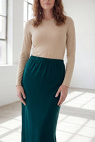 Model wearing Nuggles® 36" Classic Skirt  in Teal Green