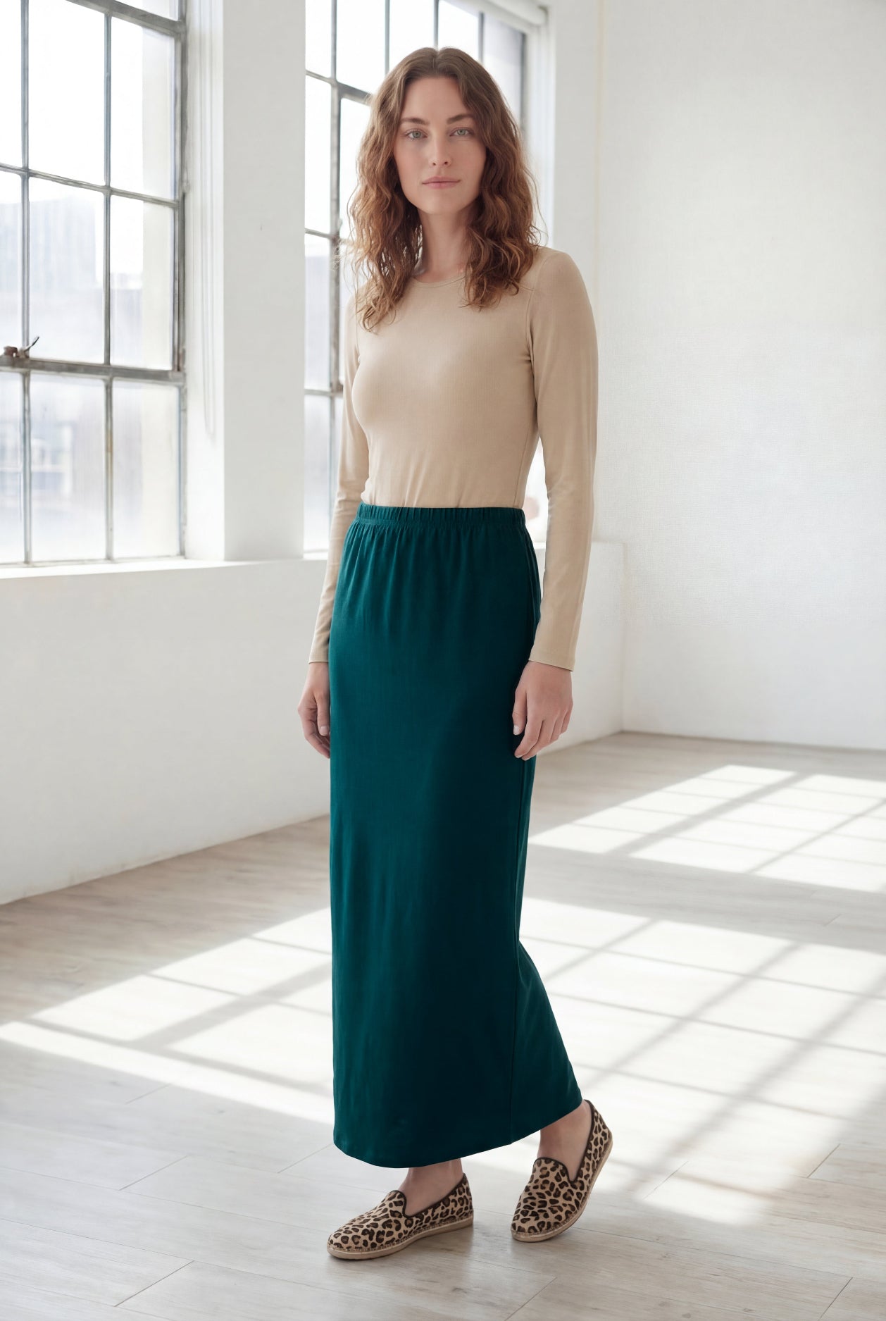 Model wearing Nuggles® 36" Classic Skirt  in Teal Green