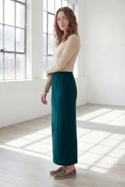 Model wearing Nuggles® 36" Classic Skirt  in Teal Green