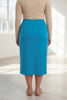 Model wearing Nuggles® 31" Classic Skirt  in Turquoise