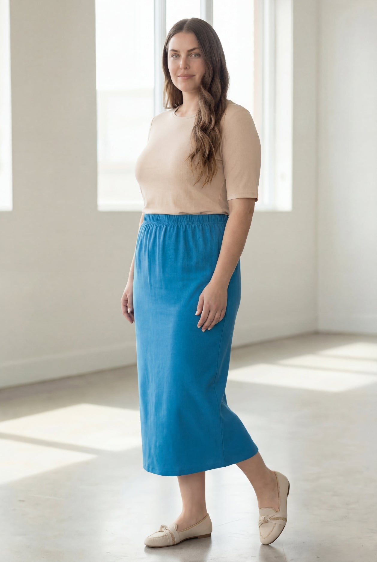 Model wearing Nuggles® 34" Classic Skirt  in Turquoise