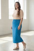 Model wearing Nuggles® 34" Classic Skirt  in Turquoise